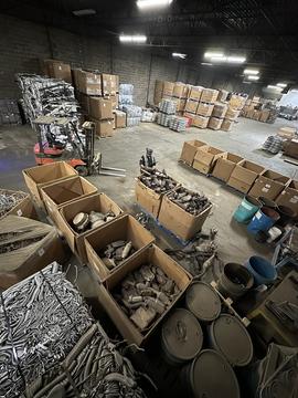 Efficient Scrap Metal Recycling Warehouse with Organized Inventory