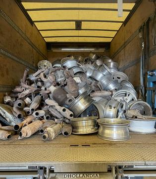 Efficient Scrap Metal Recycling Process Showcasing Collected Metal Parts